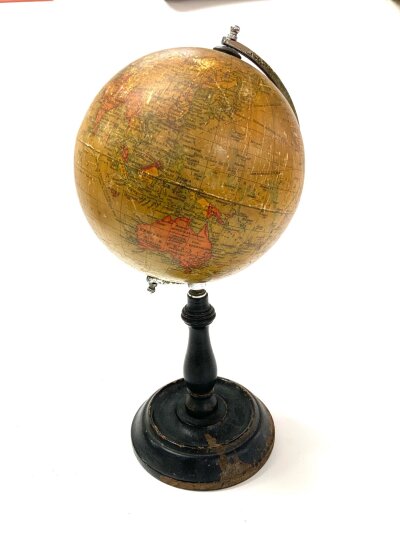 A antique  6” Geographia terrestrial globe on stand, 32cm High