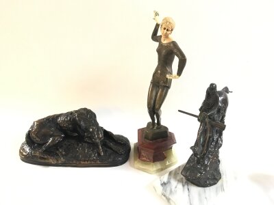 Three simulated bronze figures including a Gayrand London sleeping dog figure, art deco dancer , figure based off Frederic Remingtons "Mountain Man" 12,26 and 38cm tall.