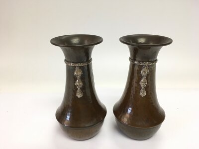 A pair of small silver mounted copper vases, approx height 13.5cm.