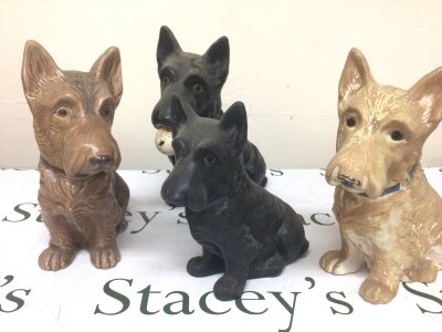 Four Vintage Sylvac dogs three 1209 models and a medium 1208 (4)