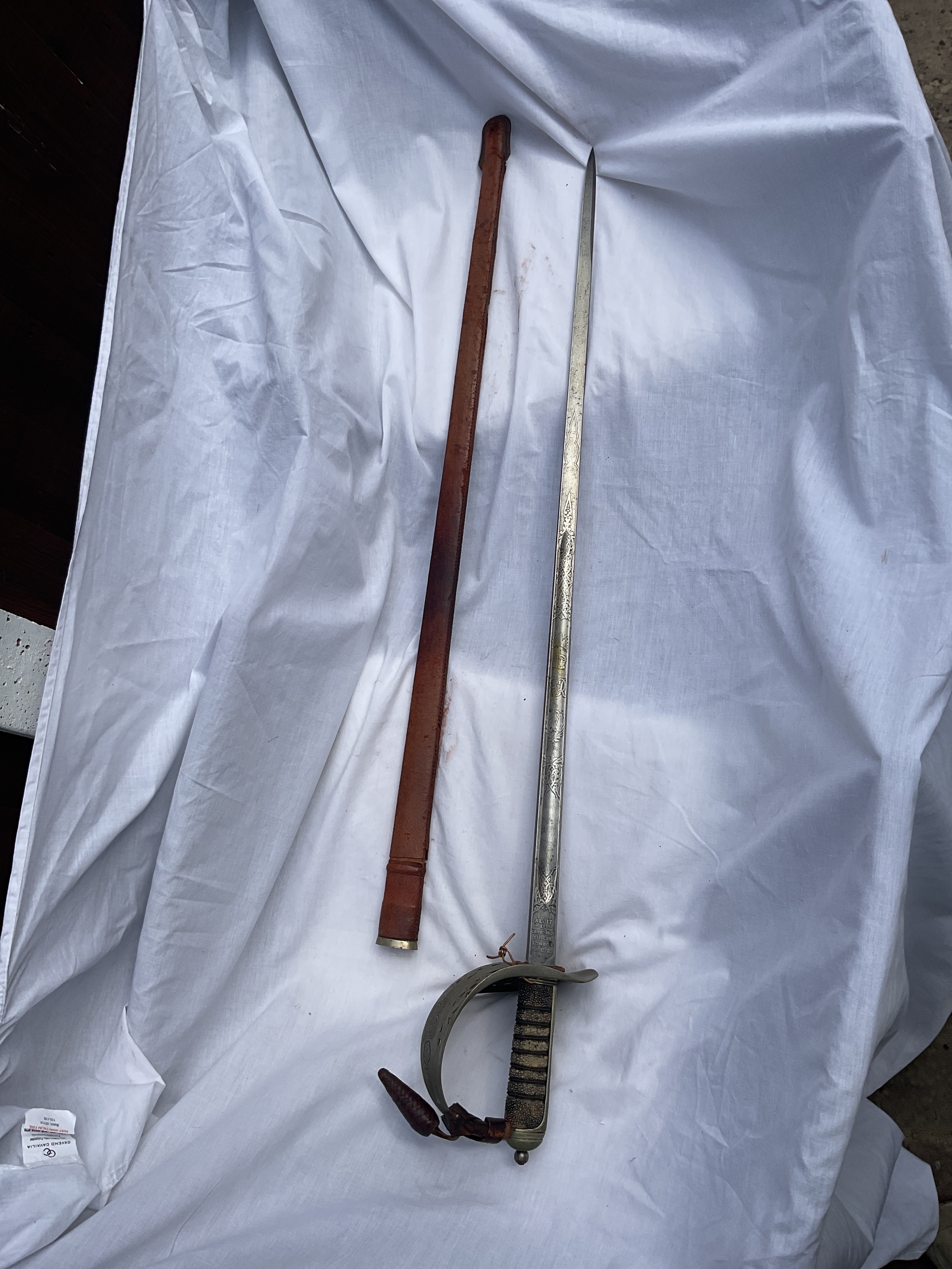 WWII GVIR Officers sword blade by Alkit Ltd  with leather portapee.