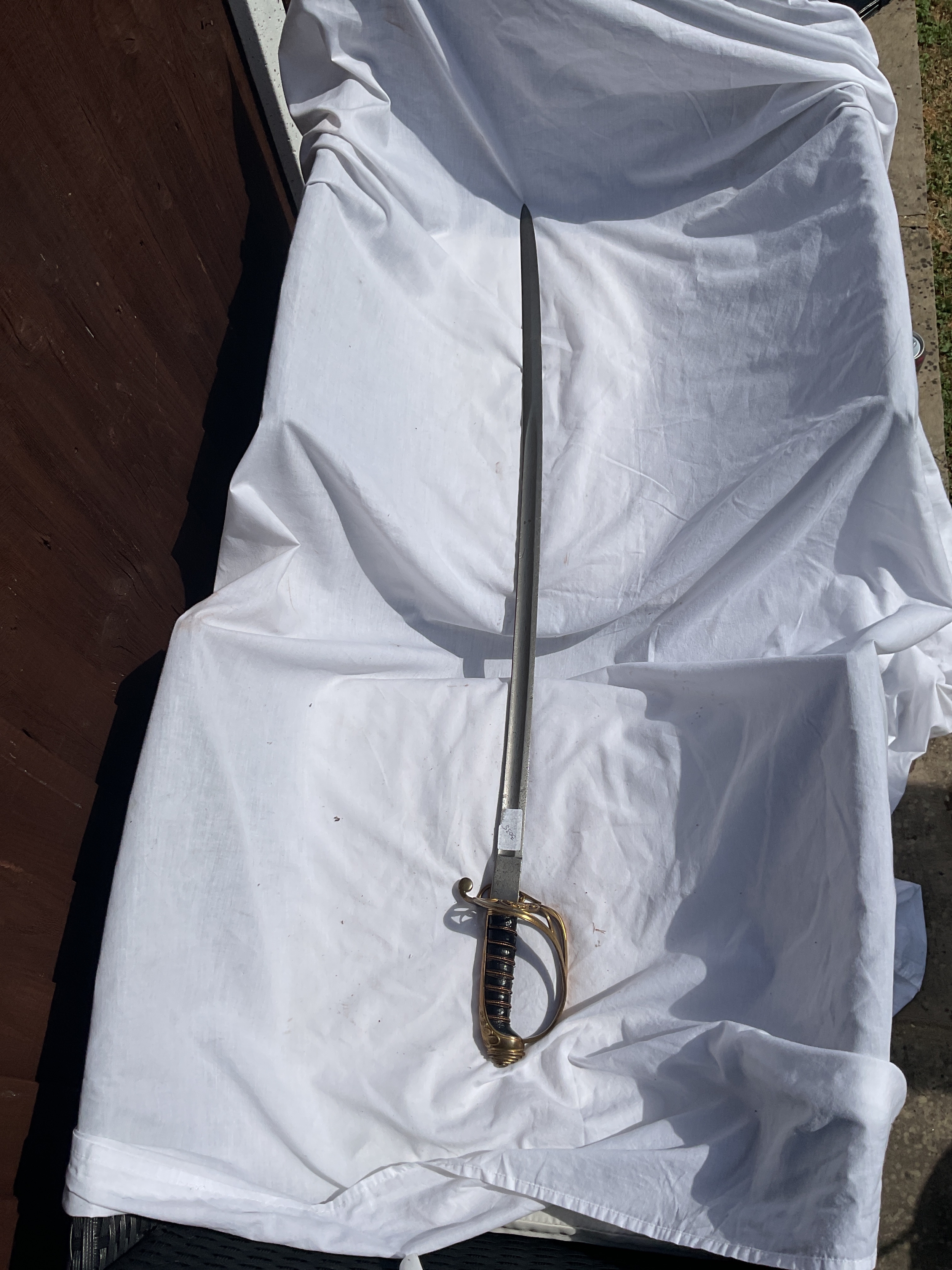 Victorian officers sword with folding flap and cypher to the hand guard.