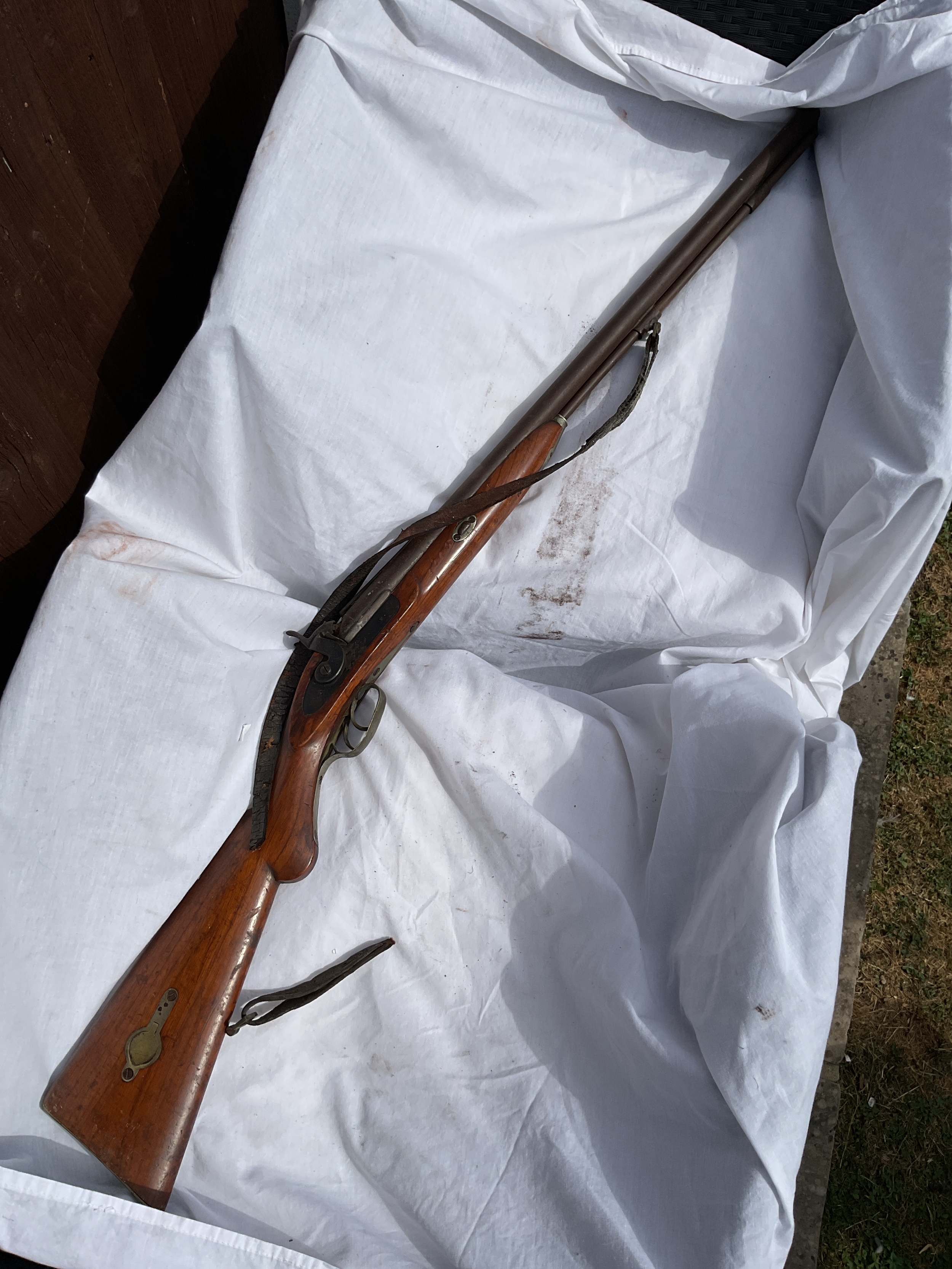 19th c double barrelled percussion shotgun with cap store to the butt, middle rib to the top lifting.