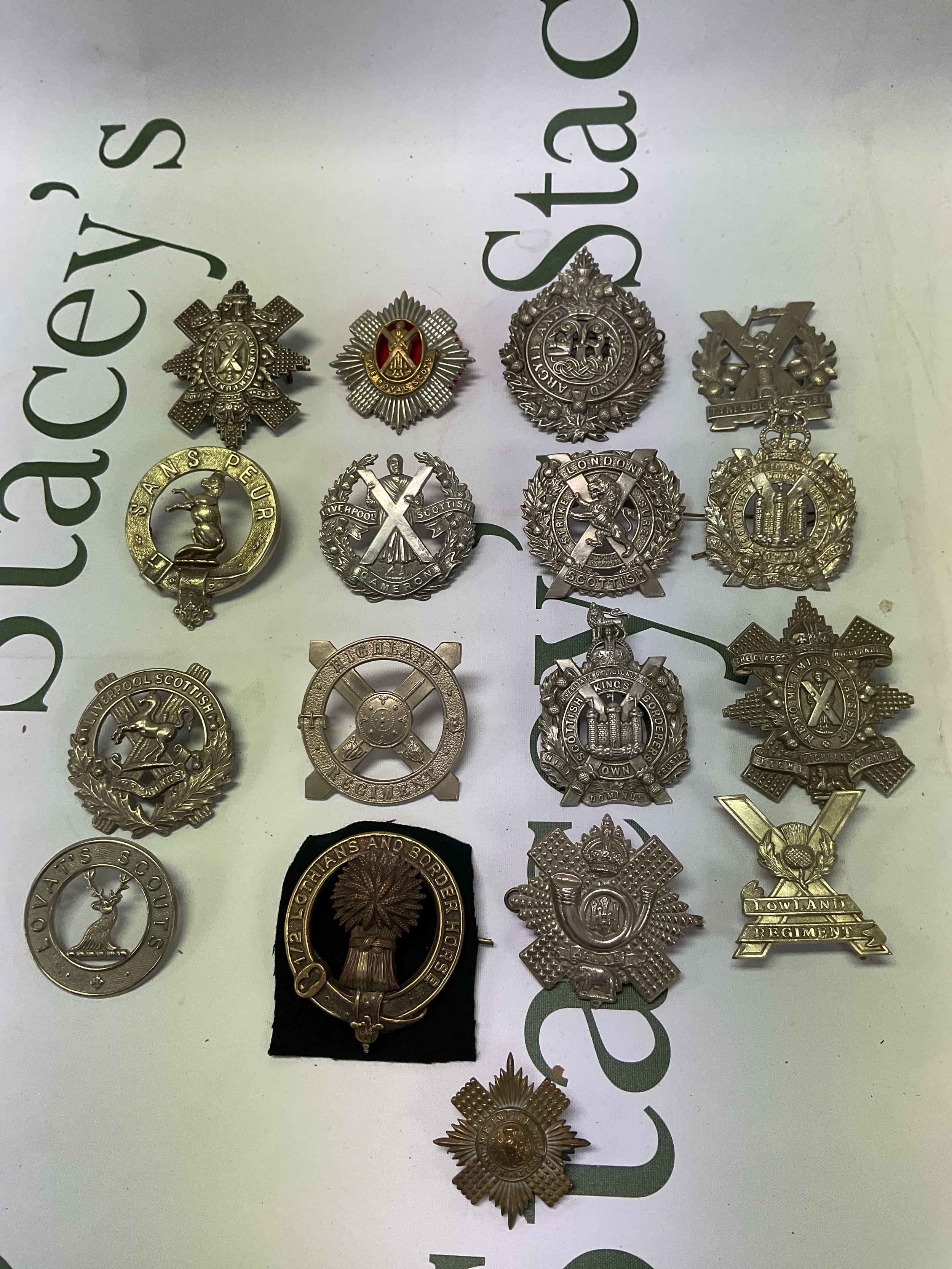 Qty of Scottish Army cap badges.