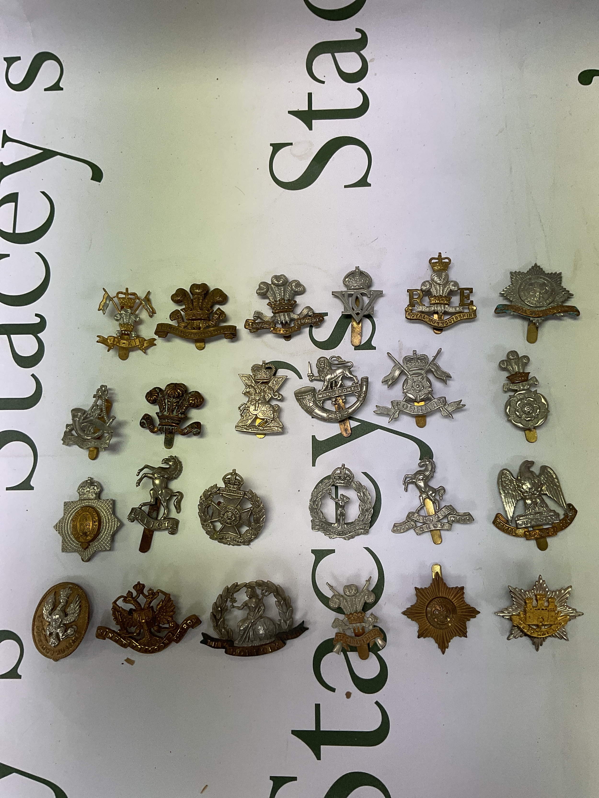 Qty Cap Badges.