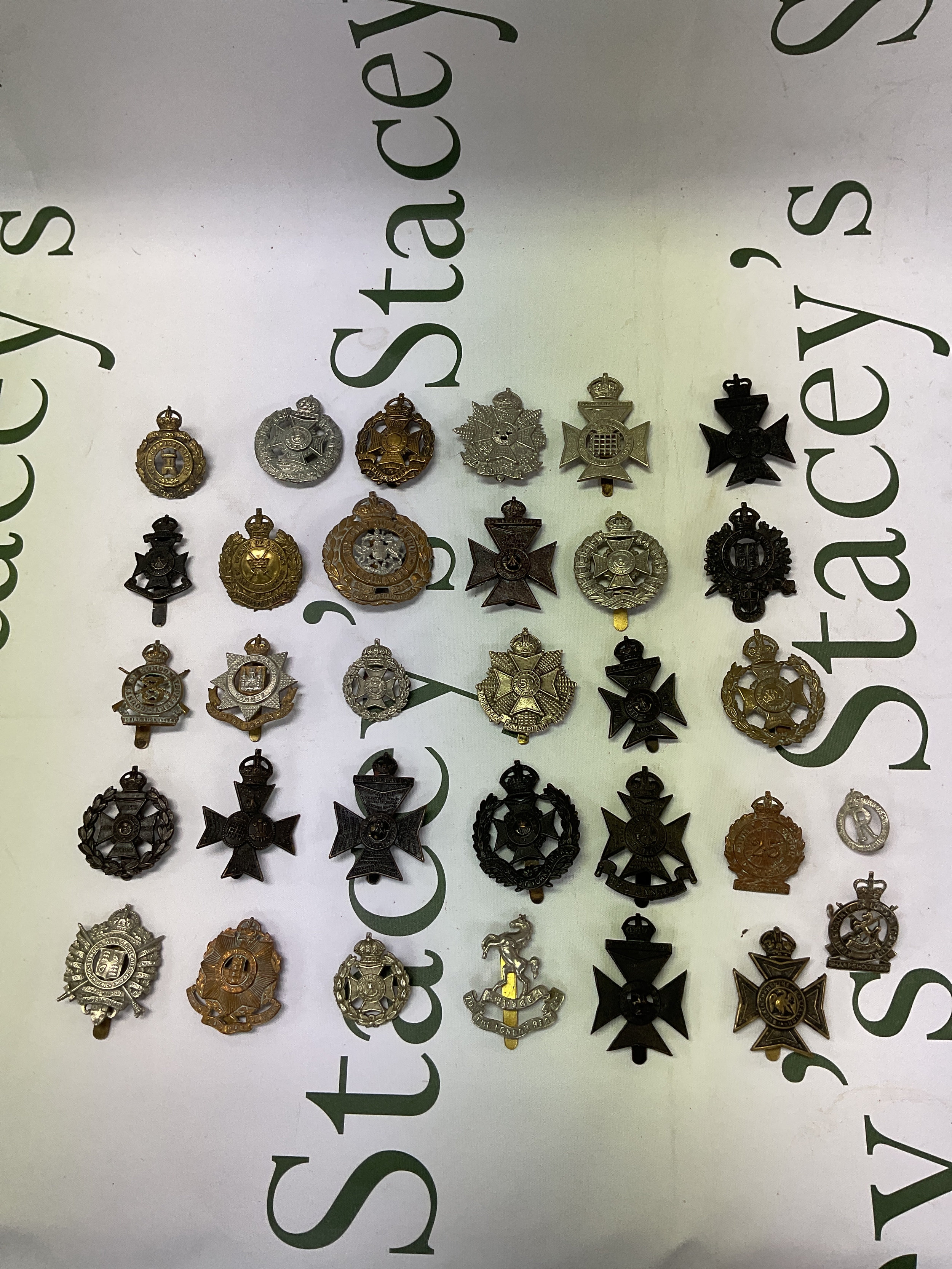 Qty of Rifle regt badges and London examples.