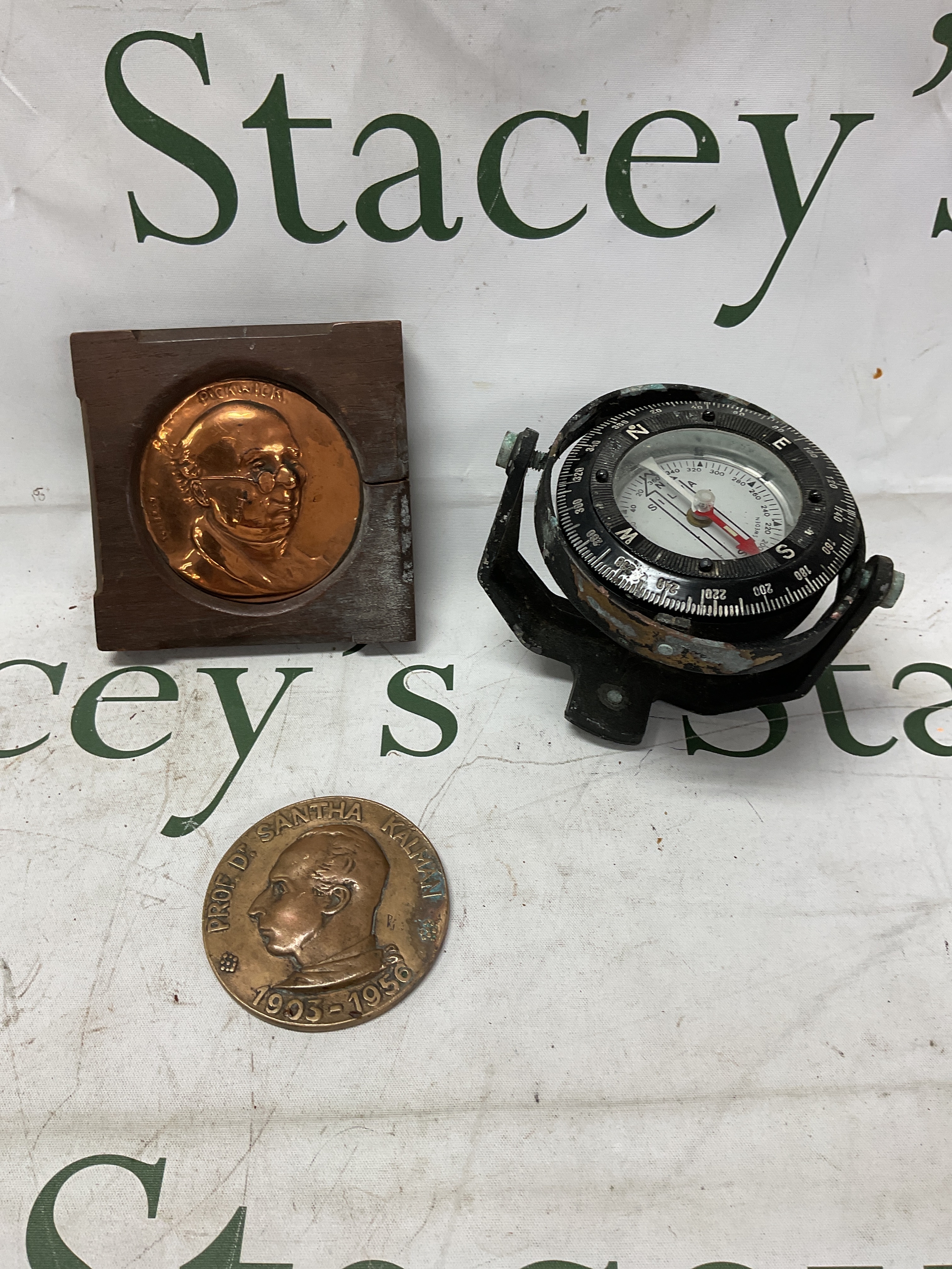 HMS Ganges wood framed Mr Pickwick, Prof Kalman medallion and a Silva  gimble mounted compass.