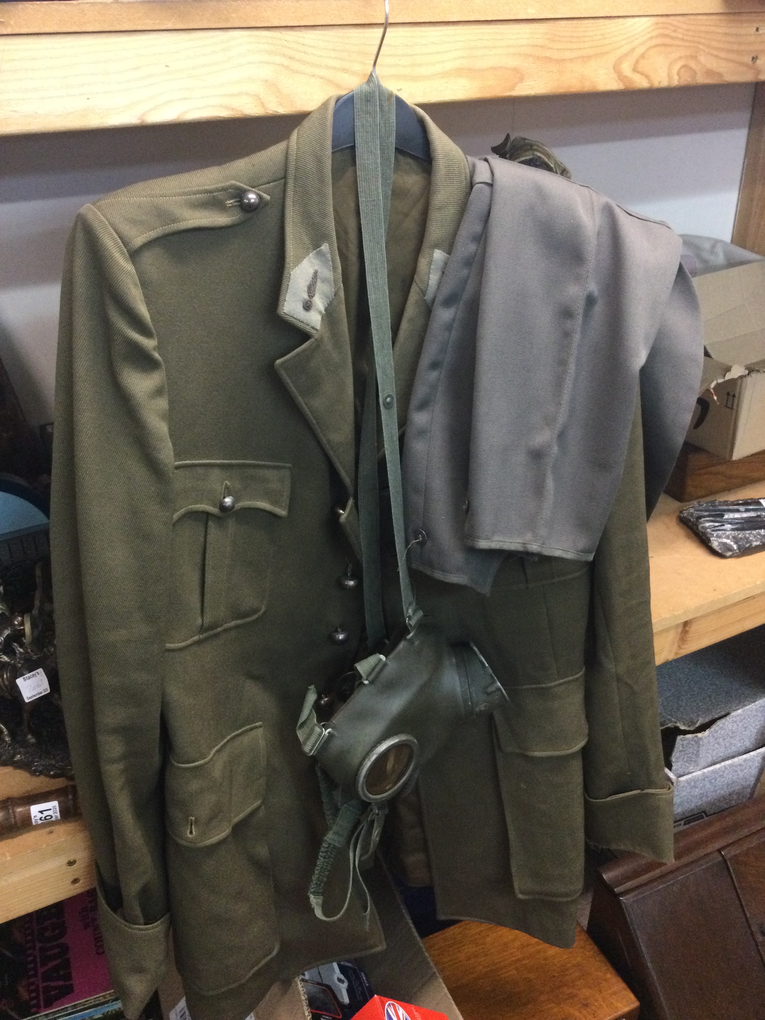 A reproduction French WW2 military jacket (46cm wide, 84cm long) with trousers and gas mask
