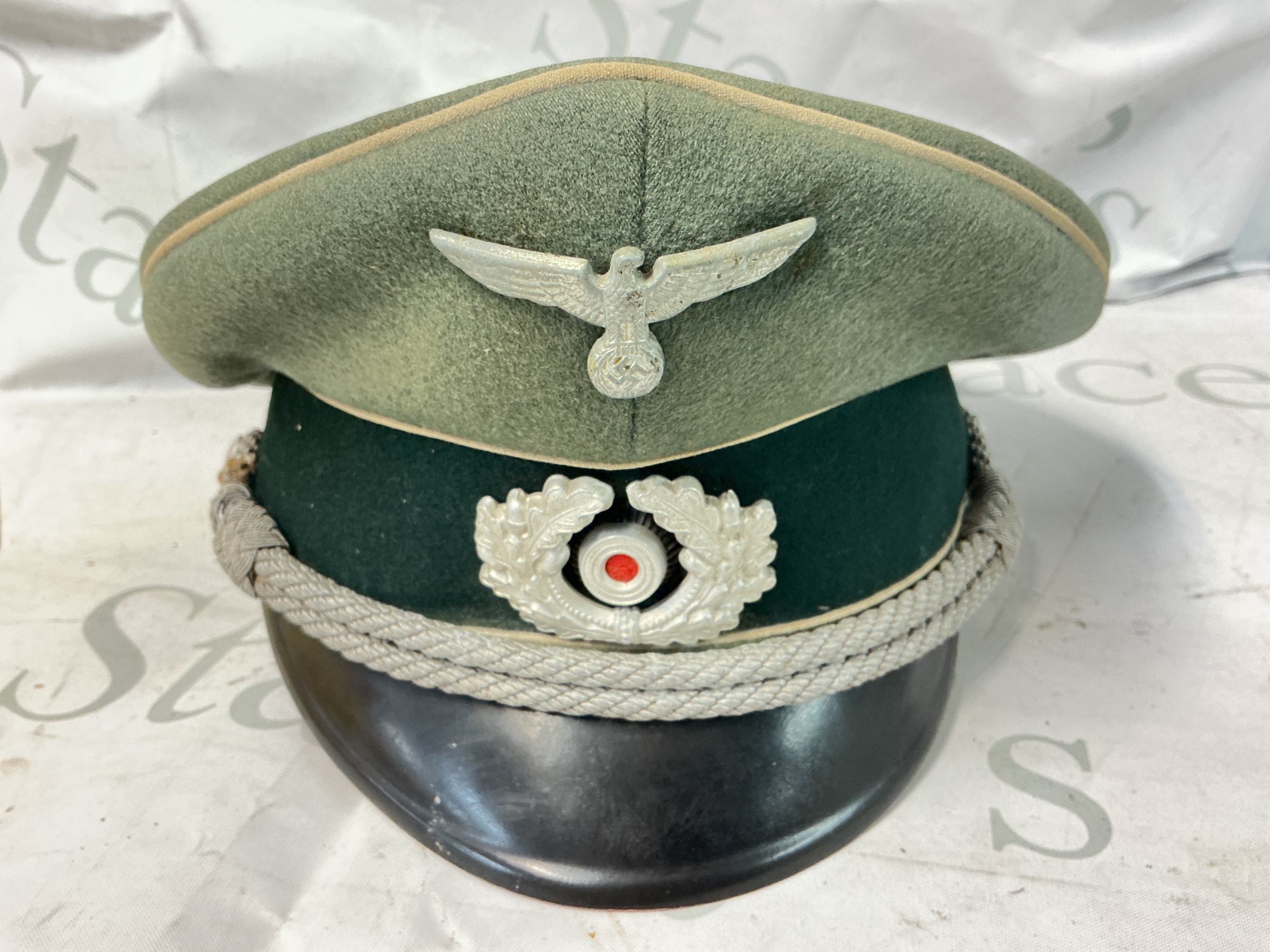 An Original WW2 German Infantry Officer Peaked Cap.