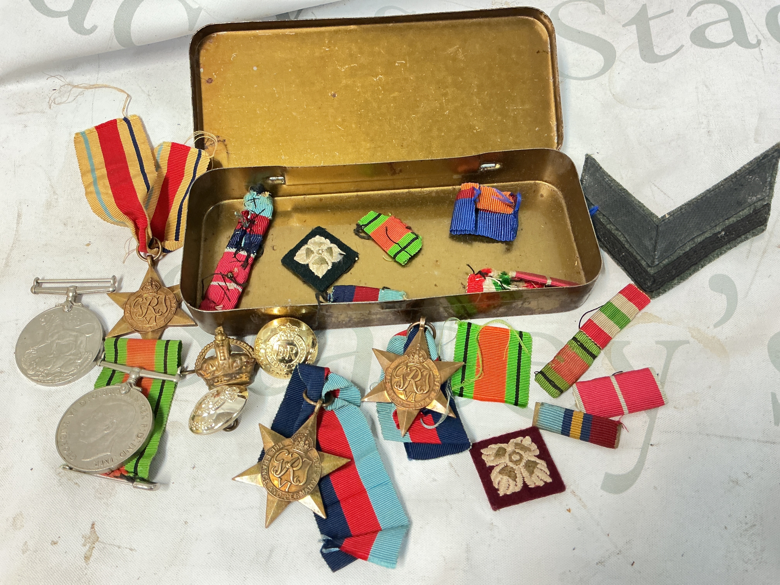 A Collection WW2 British Medals, Badges, Ribbons Etc.