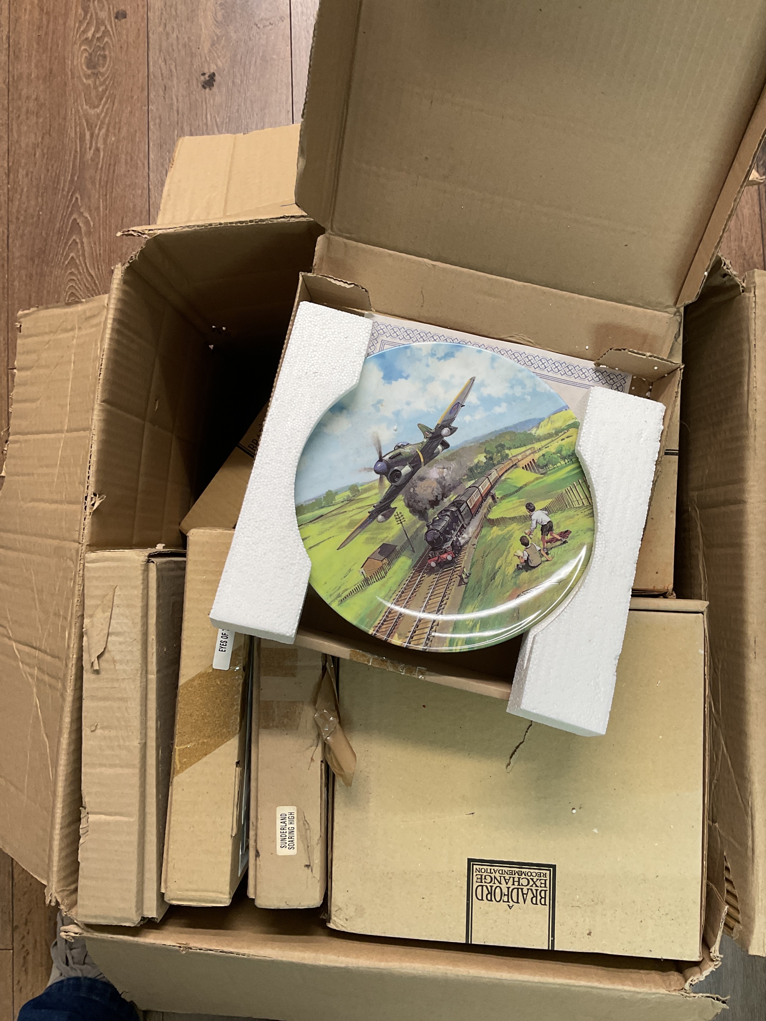 Large box of boxed military collectors plates