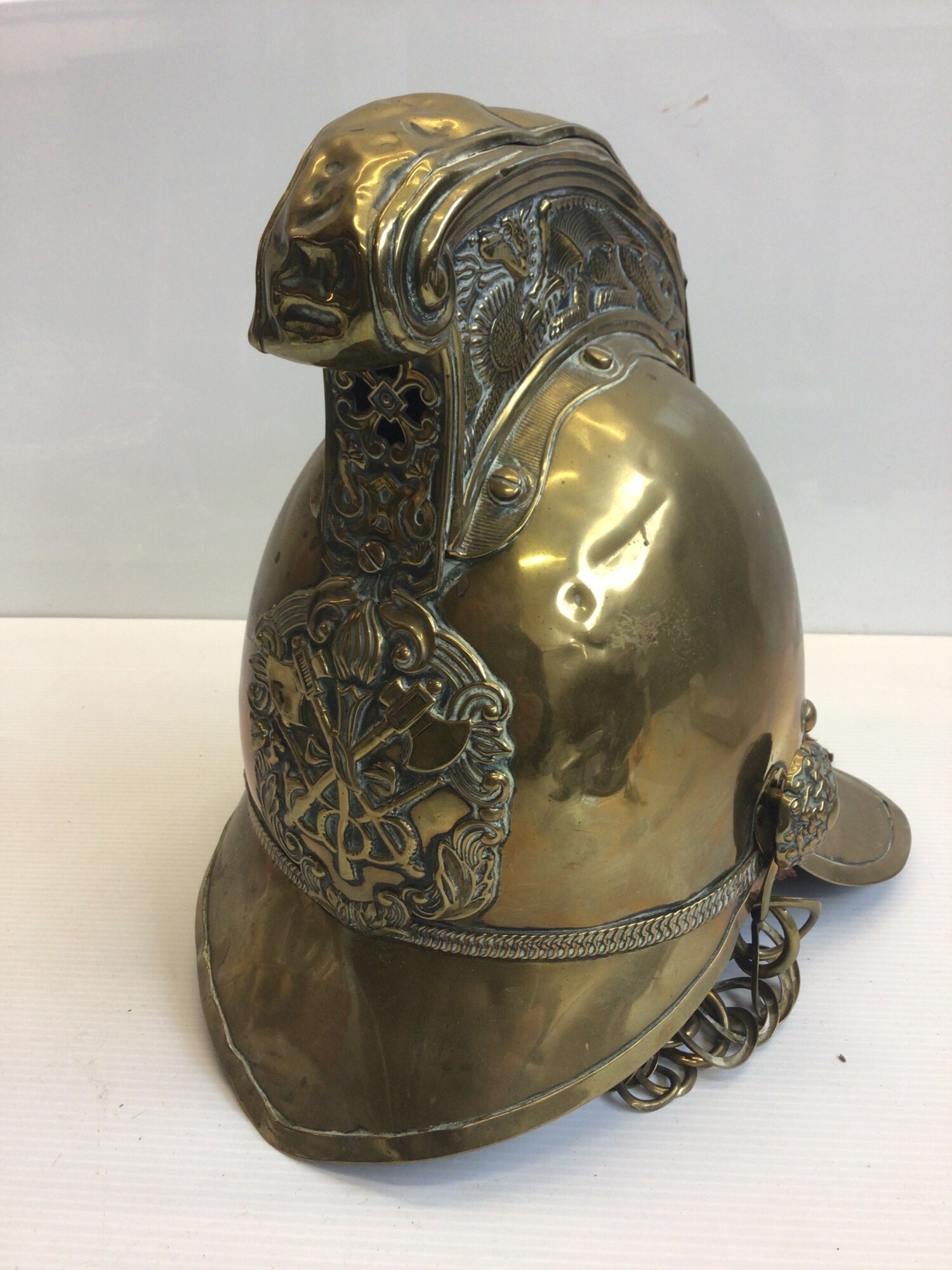 A Victorian brass Fireman's helmet.