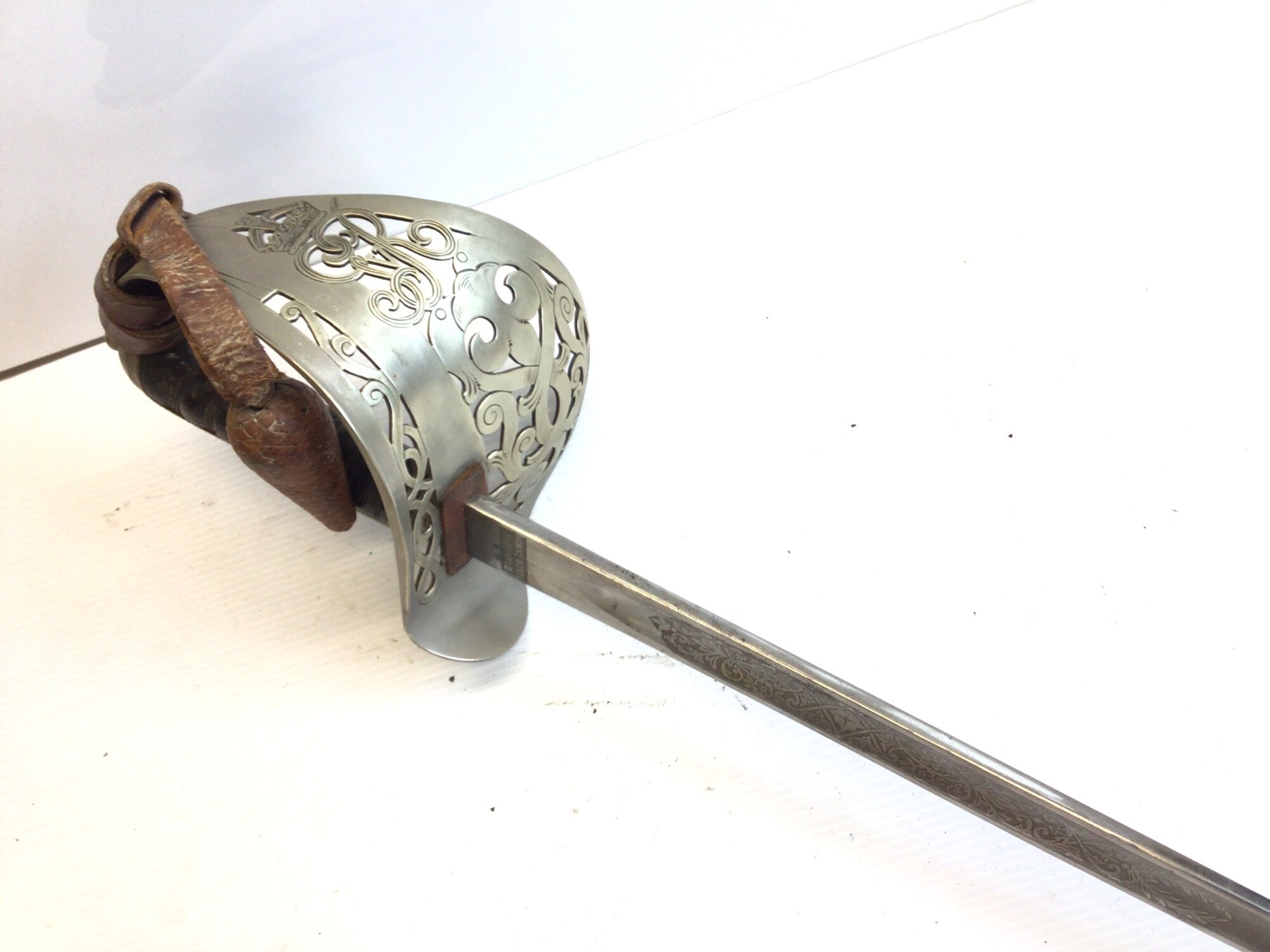 A British Military officers Sword George V the ornate guard with Royal cypher maker Hawksworth Sheffield. No scabbard.