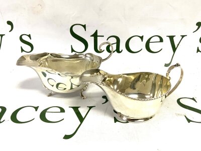 WITHDRAWN (DUPLICATE LOT) 2 hallmarked silver gravy boats. 103g/82g