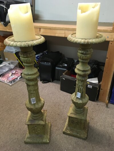 A pair of cast Iron floor candlesticks. 70cm in height