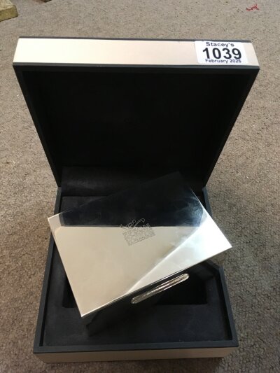 A silver plated cigarette box by Links of London, engraved Epsom Downs Racecourse. In fitted box