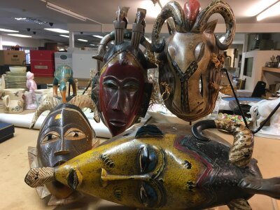 Four wooden African tribal masks with display stands. To include Guru tribe masks from Ivory Coast