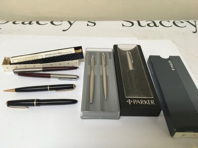 A collection of Parker Pens fountain pens and other pens.