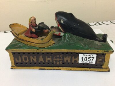 A Cast iron John the Wale money box.