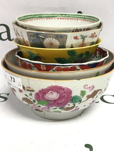 Six Chinese bowls including yellow glaze, Imari , floral designs. Damage and restoration seen on some. Sizes ranging from 9cm tall 20cm wide to 6cm tall 14cm wide