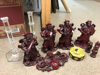 A collection of Chinese red resin figures