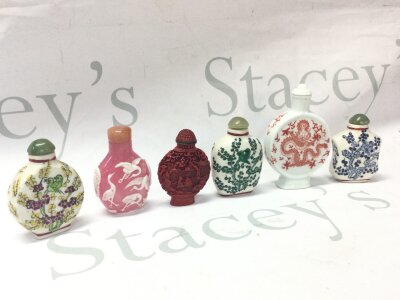 Six Chinese hand painted porcelain snuff bottles, largest 10cm high