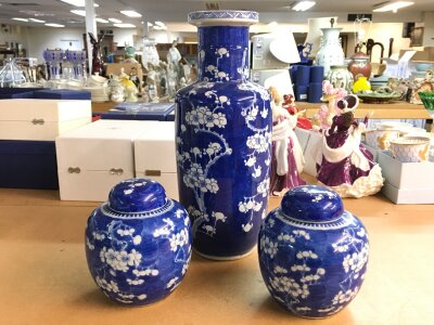 Large blue and white Chinese vase and two ginger jars. Damage and restoration on one of the lids, 15 and 35cm tall