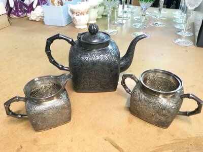 WITHDRAWN - A three piece Chinese hallmarked silver teaset. 8 and 15cm tall. 945g total weight