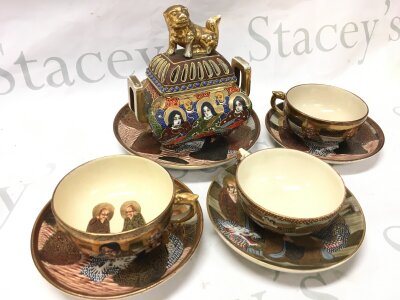 A collection of satsuma cups and vases and an incense burner
