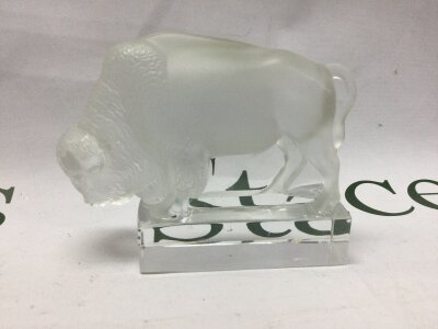 A Lalique frosted figure of a bison . 10 cm .