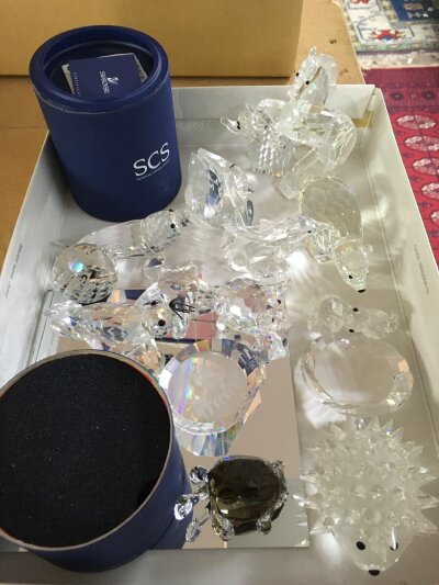 A collection is Swarovski animals including walrus, polar bear, tortoise etc