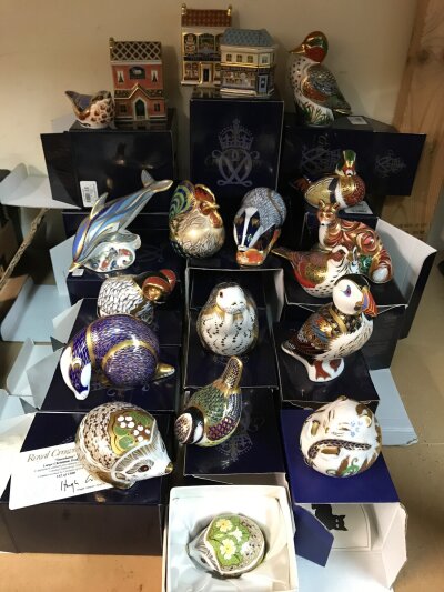 A large collection of Royal Crown Derby animals and buildings in boxes. To include a Limited edition large Christmas Hedgehog 142/1500 plus a badger, dolphin, nuthatch, fox, mallard, walrus etc. no obvious damage or restoration