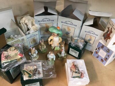 A collection of Beatrix Potter ceramics including Royal Albert Figures