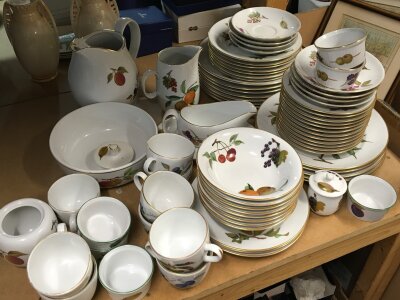 An Extensive Royal Worcester Evesham pattern dinner and tea service with numerous dishes of graduating size tureens pie dishes plates of graduating size cups saucers jugs etc.