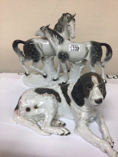 A Rosenthal porcelain dog ornament and large Porcelain figure group of two horse's. No obvious damage 36cm wide.