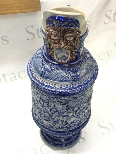 A large German Stoneware bearded jug, 54cm tall