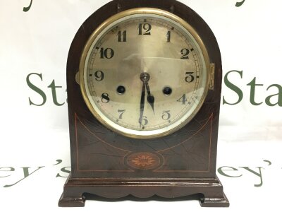 A vintage wooden cased mantle clock working order with key and pendulum. 22cm wide 26cm tall. No reserve