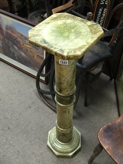 A marble plant stand. 92cm tall Approx