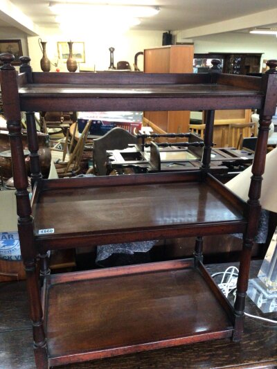 A Victorian mahogany three tier open display stand. ,