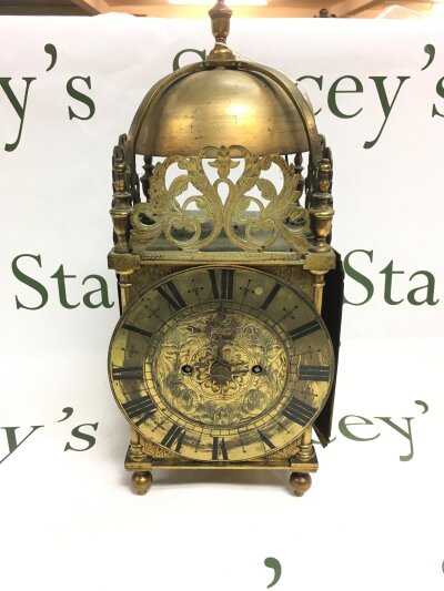 A traditional 19th century brass lantern clock.