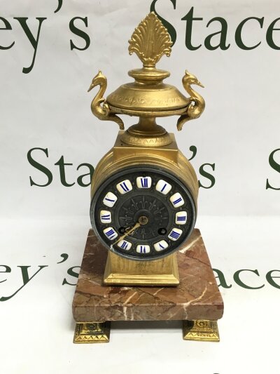 A late 19th century French guilt metal figural mantle clock, with French movement.