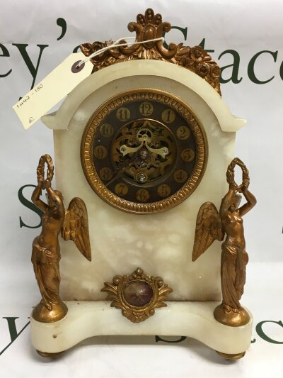 A 19th century french marble mantle clock with gilded bronze decoration, tin an 8 day striking movement.