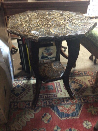 A Liberty & Co carved hardwood Japanese occasional table. Retailed by Liberty circa 1905. With a hexagonal top.