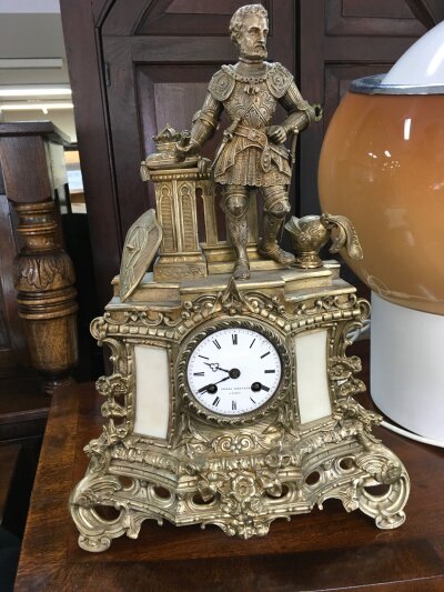 A brass French figural mantle clock, Arera Brevete Paris, 44cm tall, 30cm wide