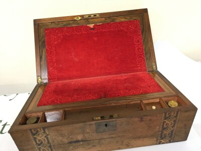A Late Victorian large inlaid walnut writing slope with a well fitted interior. 45cm wide 18cm high.