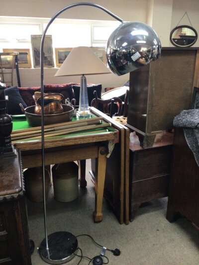 A modern design free standing chrome lamp