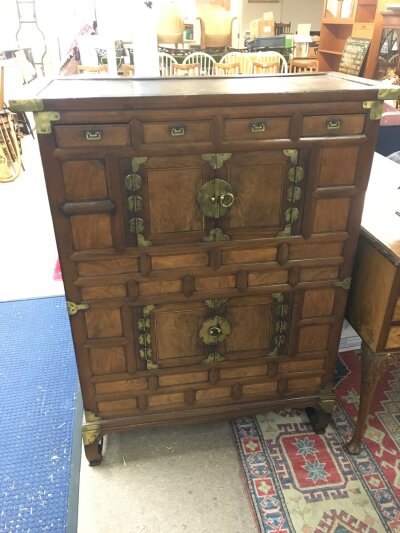 A 19th century or earlier South Korean Elm brass mounted wedding chest. Dimensions 95cm wide, 122cm tall, 44cm long
