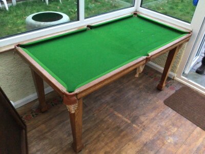 An Oak Snooker dining table 1/4 size with a slate bed with adjustable height oak bars with pool balls snooker balls and accessories nice condition