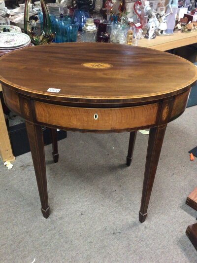 A quality 19th century Mahogany and satinwood occasional table of oval shape with a single drawer on square legs  top diameter 81cm