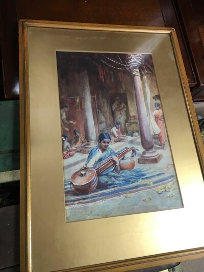 A framed watercolour of figures at a Hindu temple, signed by Emily Florence mason . Frame dimensions 42x58cm